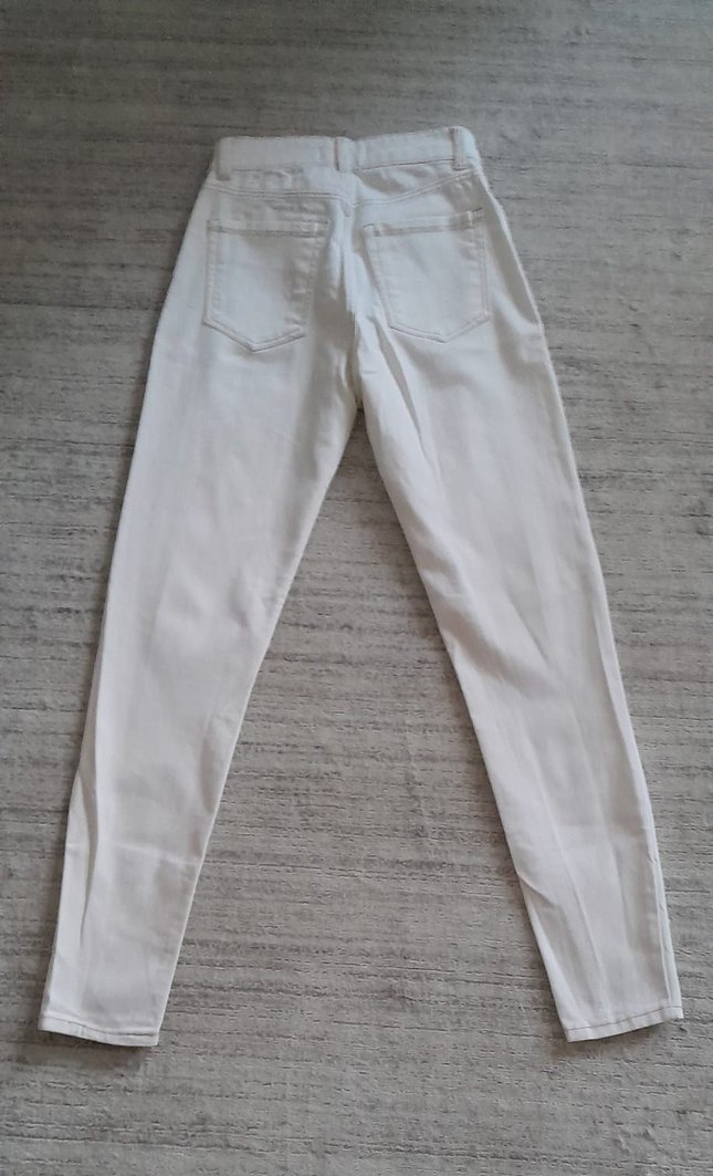 ekruya bakan tonlarda denim pantolon. - Görsel 4