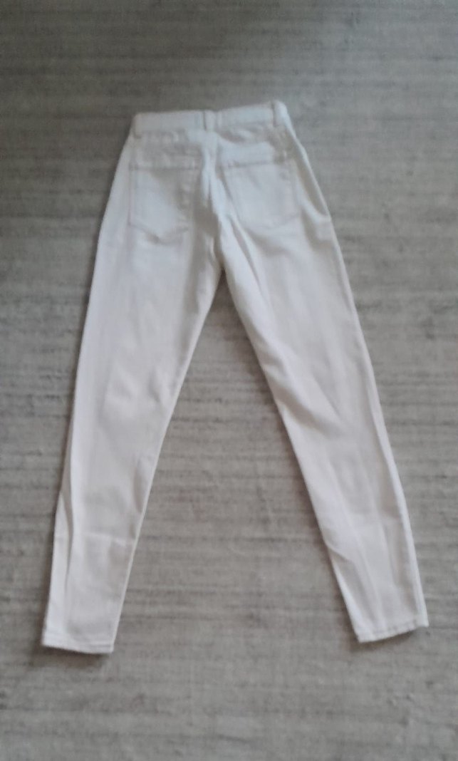 ekruya bakan tonlarda denim pantolon. - Görsel 2