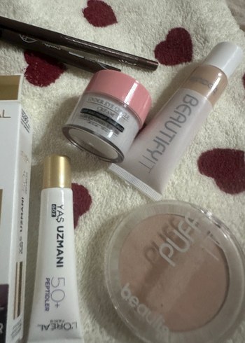 Diğer L'Oréal Yaş Uzmanı Gündüz Kremi SPF 50+ ve çeşitli cilt bakımı