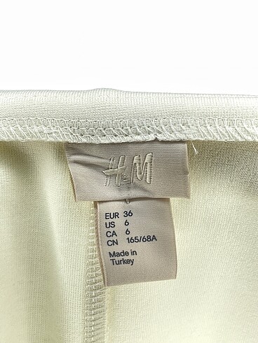 36 Beden beyaz Renk H&M Mini Etek %70 İndirimli.