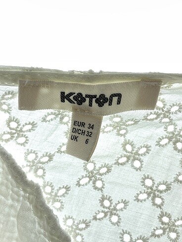 34 Beden beyaz Renk Koton Kısa Elbise %70 İndirimli.