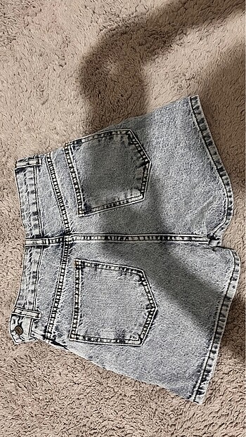 Trendyol & Milla Mavi yırtmaçlı denim şort etek