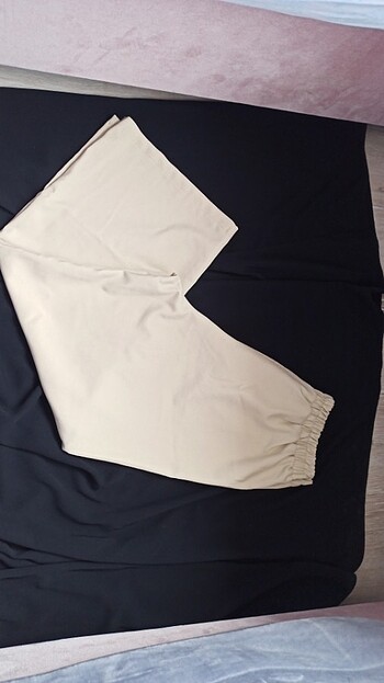 Beli lastikli bol paça pantolon