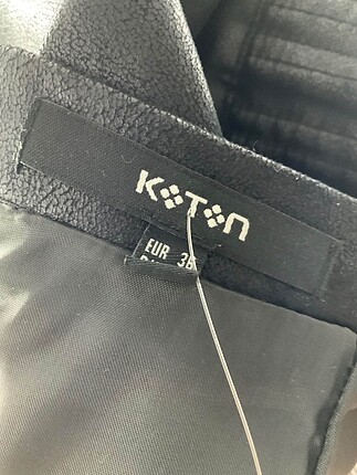 36 Beden Koton Mini Etek %70 İndirimli.