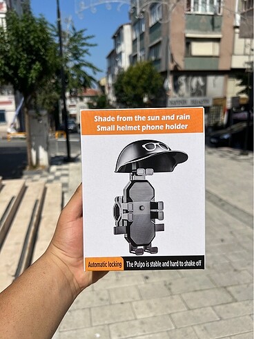 Şapkalı darbe emicili telefon tutucu