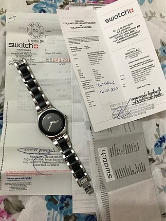Swatch siyah metal karma kordonlu saat
