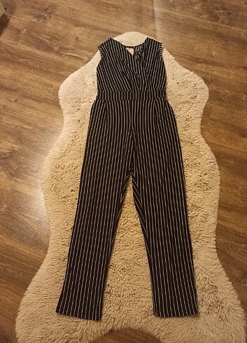 tulum esnektir L -XL bedene uyumludur sadece 1 kere kullanildi