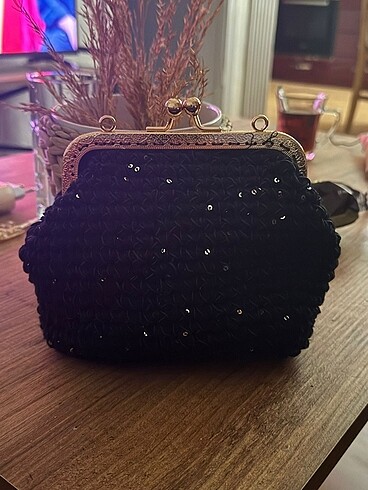 Pullu örme el çantası