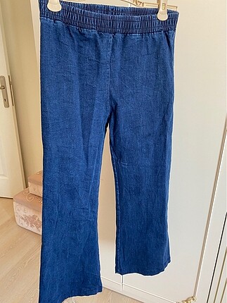Beli lastikli İspanyol paça kot pantolon