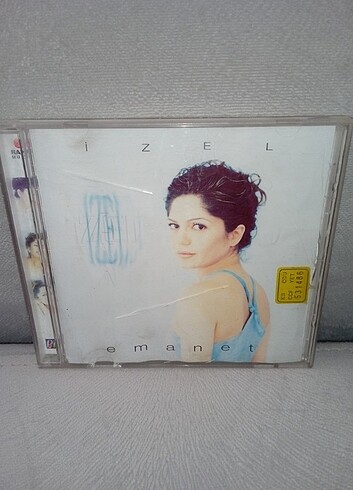 CD İzel emanet albümü. Raks 1997 sarı bandrollü albüm. kartoneti