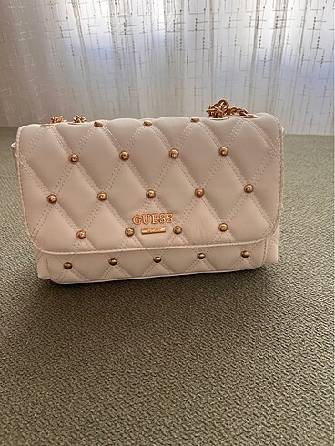 Guess canta