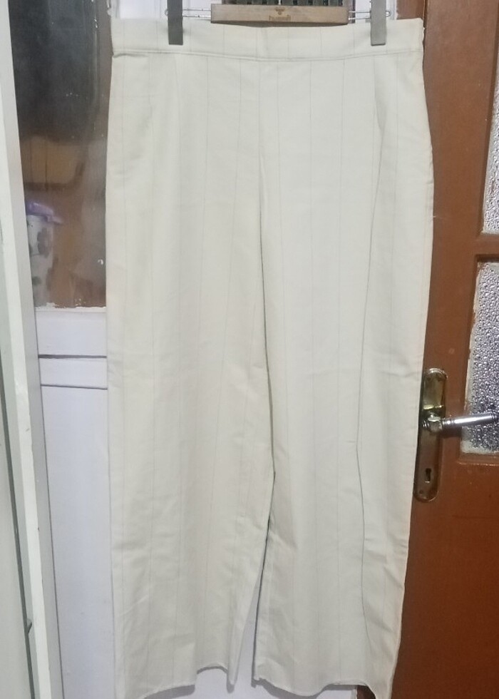 Krem rengi sıfır pantolon 42 beden Gizli fermuar detayı - Görsel 3
