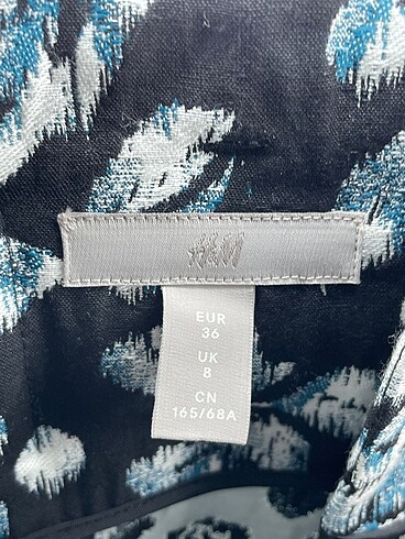 36 Beden çeşitli Renk H&M Midi Etek %70 İndirimli.