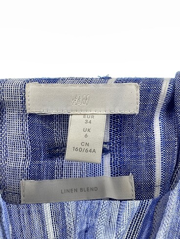34 Beden mavi Renk H&M Midi Etek %70 İndirimli.