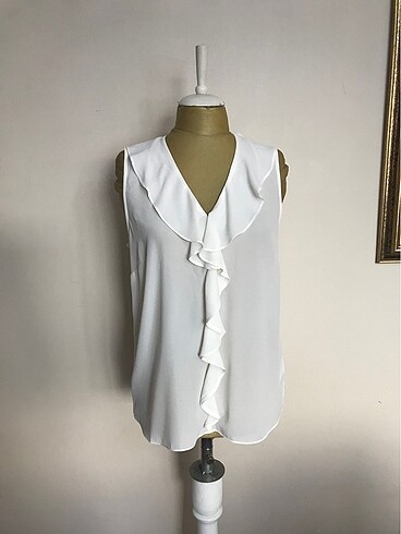 H&M markanın krem renk bluzu