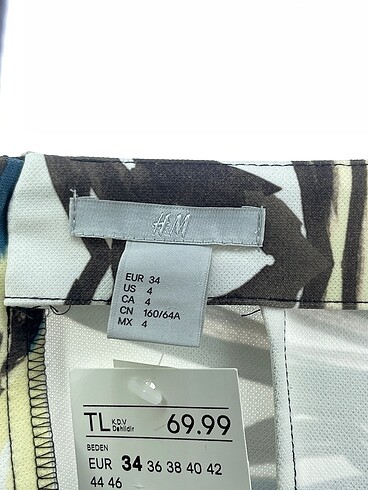 34 Beden çeşitli Renk H&M Midi Etek %70 İndirimli.