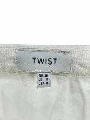 36 Beden beyaz Renk Twist Gömlek %70 İndirimli.