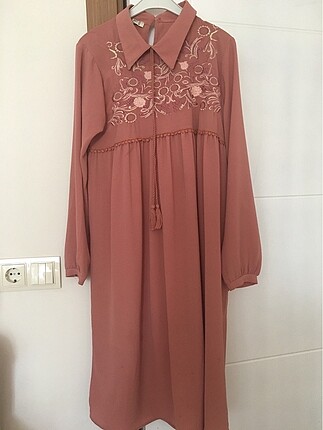Pembe tunik