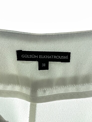 38 Beden beyaz Renk PreLoved Kumaş Pantolon %70 İndirimli.