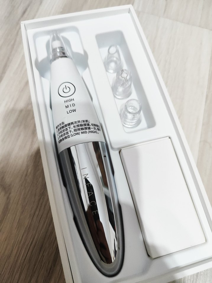 Beyaz ve Gri Yüz Temizleme Cihazı - Görsel 2