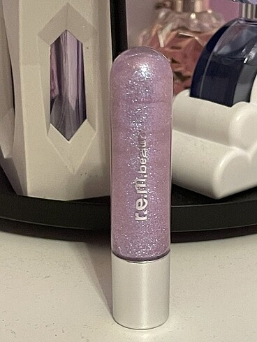 rem beauty chuckie gloss