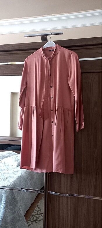 Pembe tunik