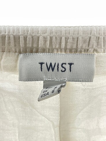 34 Beden beyaz Renk Twist Düz Kesim %70 İndirimli.