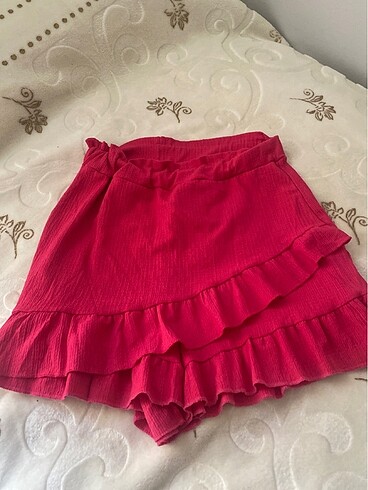Pembe şort etek