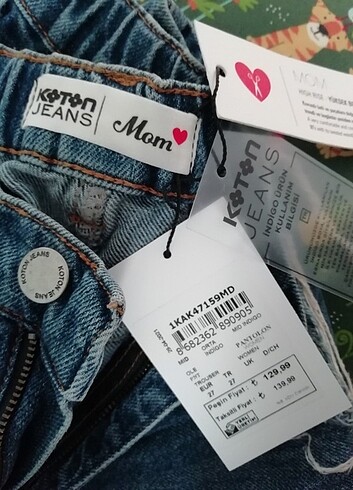 36 Beden Koton mid indigo jeans yırtık detaylı 