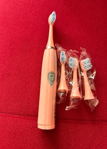 Pembe Elektrikli Diş Fırçası ve Yedek Başlıklar