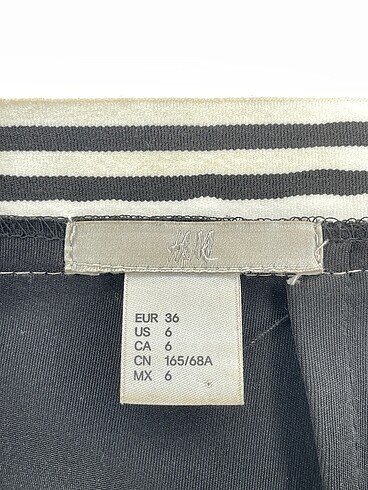 36 Beden siyah Renk H&M Midi Etek %70 İndirimli.