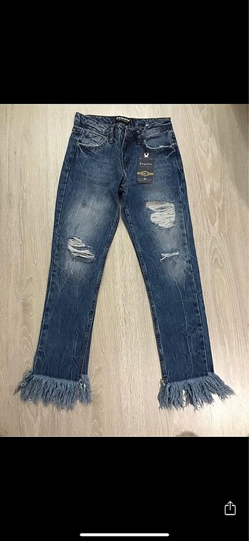 püsküllü paça kot pantolon