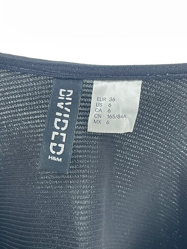 36 Beden siyah Renk H&M Kısa Elbise %70 İndirimli.