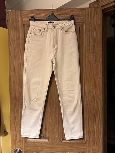 Krem kot pantolon