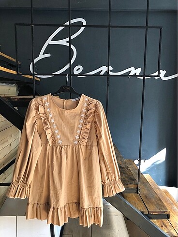 42 beden etiketli tunik bluz