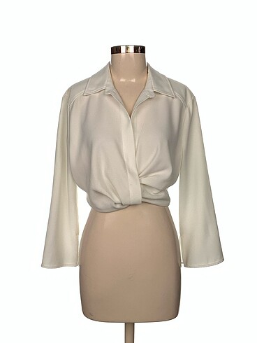 Zara Bluz %70 İndirimli.