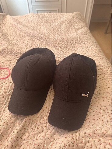 puma ve düz siyah şapka