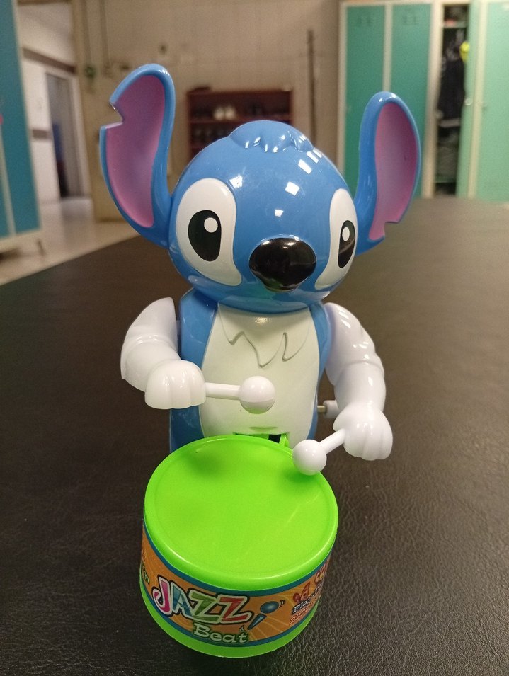 Mavi Stitch Figürlü Oyuncak sesli telefon ve davulcu bir arada - Görsel 5