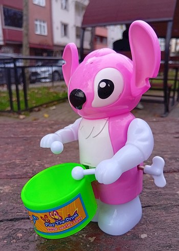 Pembe Stitch Figürlü Oyuncak sesli telefon ve davulcu bir arada - Görsel 3