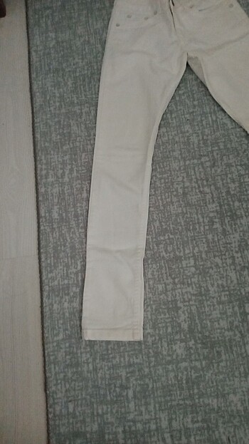27 Beden Beyaz ligralı dar paça pantolon 