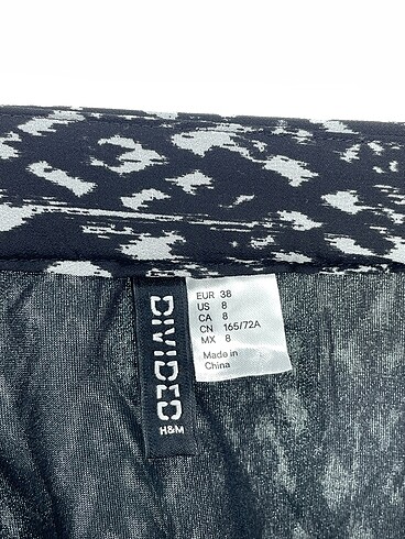 38 Beden siyah Renk H&M Mini Etek %70 İndirimli.