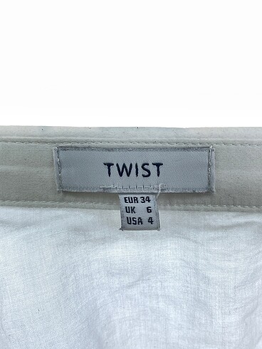 34 Beden beyaz Renk Twist Gömlek %70 İndirimli.
