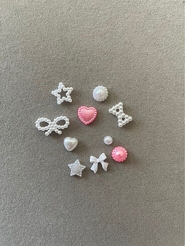 10 LU TIRNAK CHARM