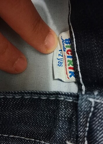 Etiketli pantolon 