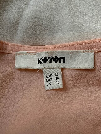 38 Beden Koton Bluz %70 İndirimli.