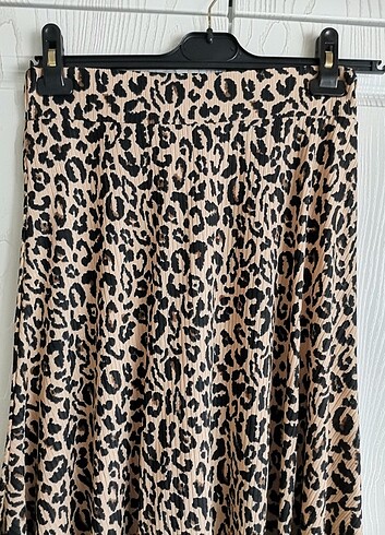 38 Beden Asimetrik kesim leopar desenli midi etek