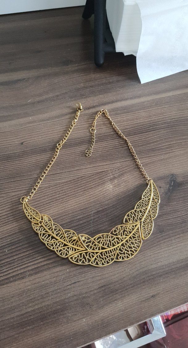 altın rengi metal şık bir takı - Görsel 5