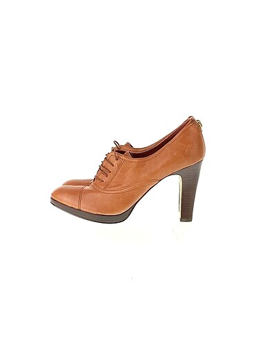 Nine West Dolgu Topuk %70 İndirimli.