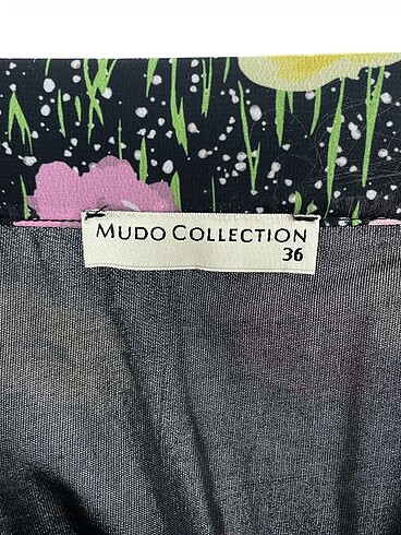 36 Beden çeşitli Renk Mudo Midi Etek %70 İndirimli.
