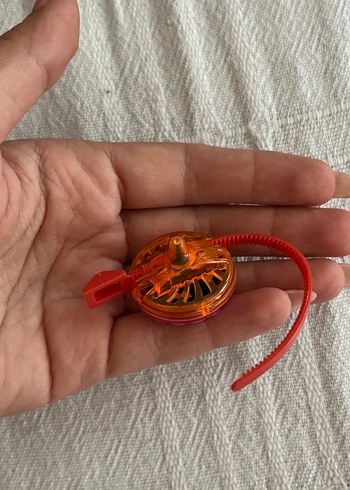 Turuncu Renkli Mini Döner Aksiyon Figürü